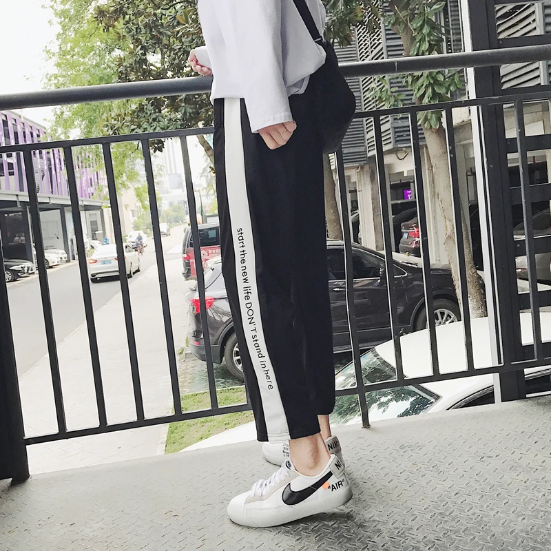 Men's trousers 2019 spring and summer nine pants loose stitching straight printing travel leisure trend youth men's clothing