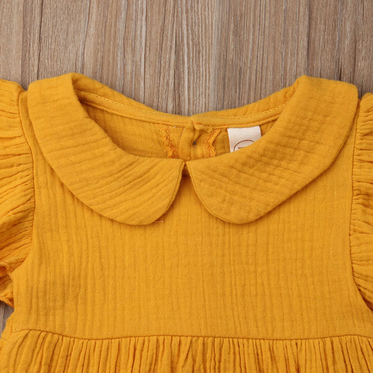 0-24 M لطيف الوليد طفلة الكشكشة أكمام بيتر بان طوق القطن رومبير بذلة ملابس Sunsuit ملابس الأصفر 0-24 M لطيف الوليد طفلة الكشكشة أكمام بيتر بان طوق القطن رومبير بذلة ملابس Sunsuit ملابس الأصفر