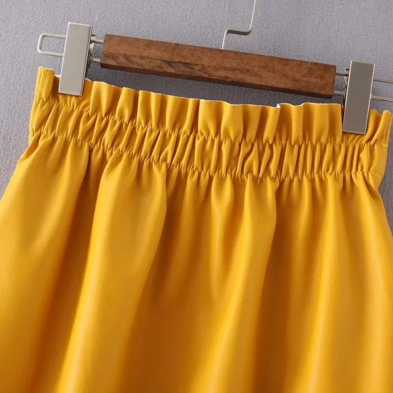 Модные весенне-осенние однотонные юбки из искусственной кожи, повседневные юбки трапециевидной формы в стиле ампир, женские мини-юбки с эластичным поясом