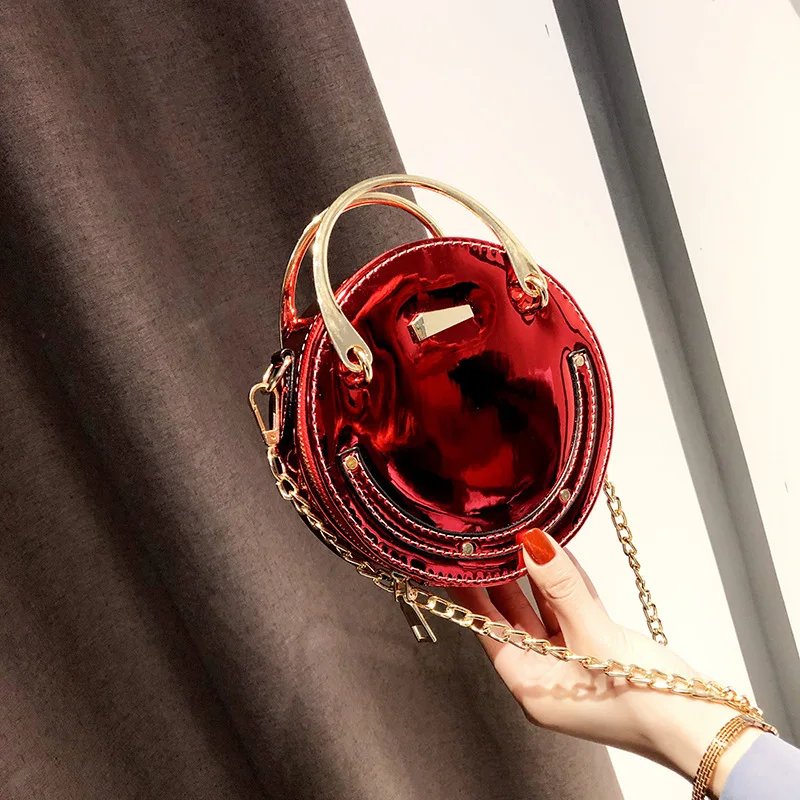 

2018 NEW PERSONALITY LASER CHAIN MINI PORTABLE SMALL ROUND BAG SMALL SATCHEL FASHION OBLIQUE SATCHEL WOMEN DESIGNER BAGS WALLET
