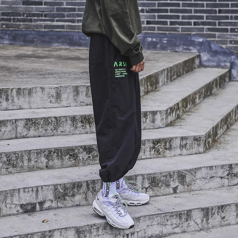 Men's Trousers 2019 Spring New Loose Feet Drawstring Trousers Youth Popular Casual Pants Black White Youth Casual Men's Clothing