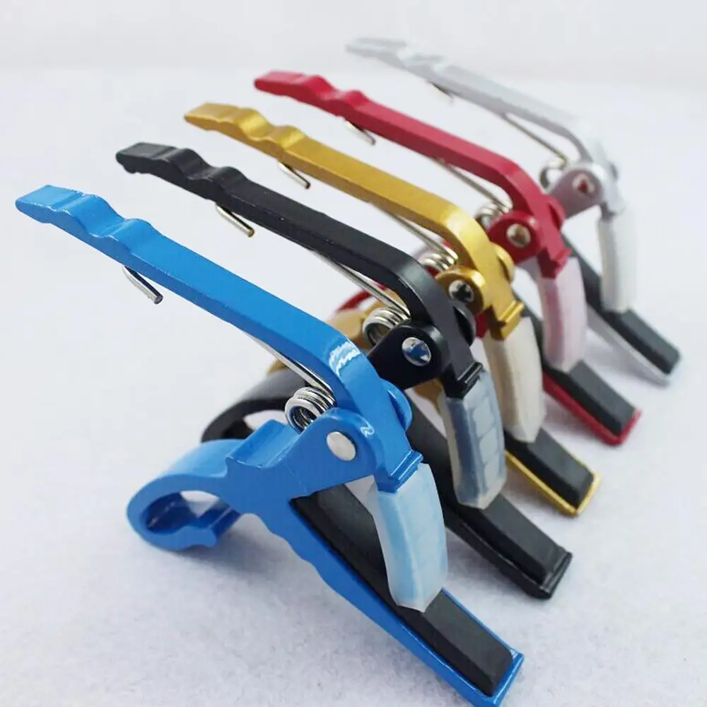 

Aluminum Alloy Guitar Tuner Clamp Professional Key Trigger Capo for Acoustic Electric Guitar Musical Instrument Random Color