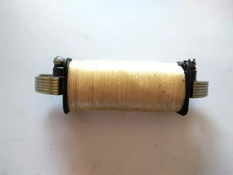 

free shipping motorcycle AX100 inner rotor ignition stator magneto coil for suzuki 2 stroke 100cc AX 100 spare parts