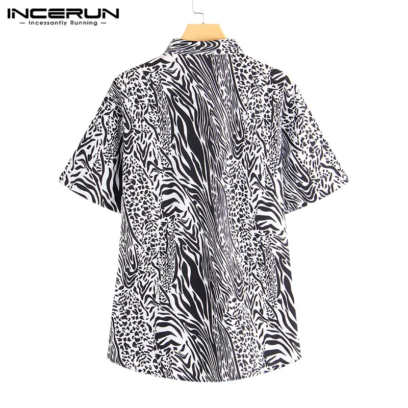 2019 مثير أزياء الرجال قمصان اللباس كم قصير التلبيب الياقة ليوبارد طباعة المحملة قمم الذكور Camisas قميص كبيرة 5XL الرجال الملابس 2019 مثير أزياء الرجال قمصان اللباس كم قصير التلبيب الياقة ليوبارد طباعة المحملة قمم الذكور Camisas قميص كبيرة 5XL الرجال الملابس