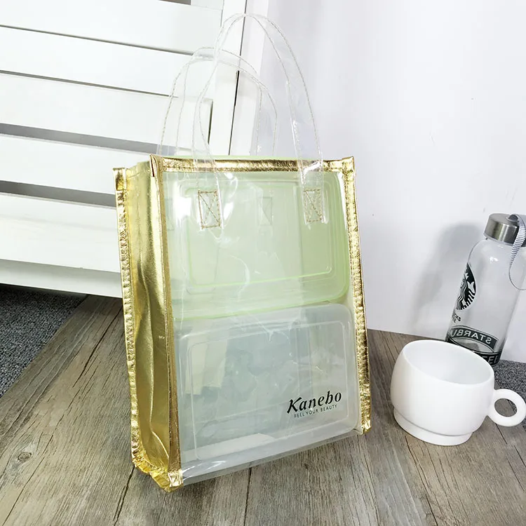 

Gold-rimmed transparent bin for carry-on lunch bags available for custom