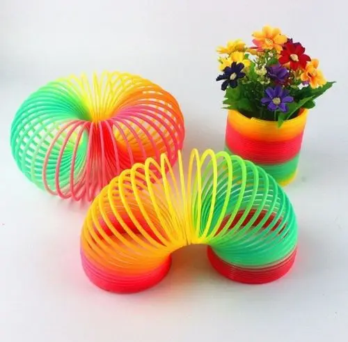 

Glow in Dark Walking Rainbow Spring Toy Gift Circle Magic Plastic Slinky Stretchy Coil Fun Colorful Children Funny Classic Gift