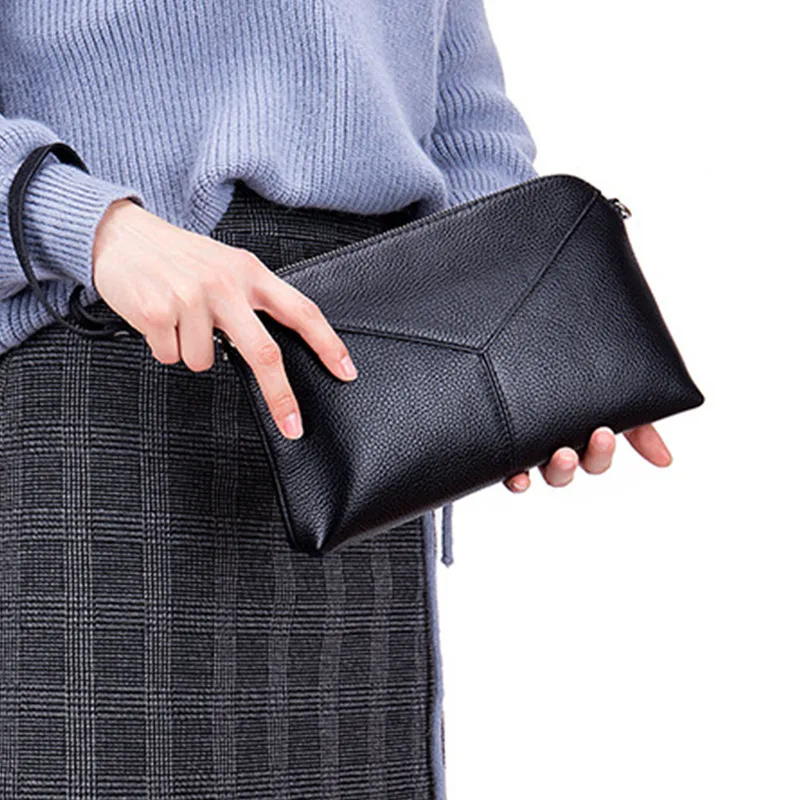 soft black leather clutch bag