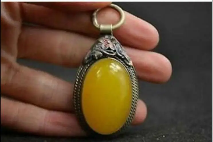 

Chinese Old Tibet Miao Silver Carving Flower Inlay Yellow Jade Pendant