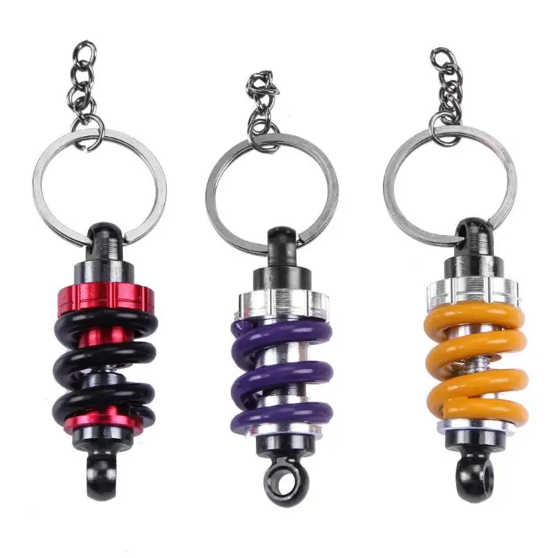 

1Pcs Universal Shock Absorber Shaped Metal Key Chain Gift Motorcycle Decor Ashion Pull The Wind Cool Keychain