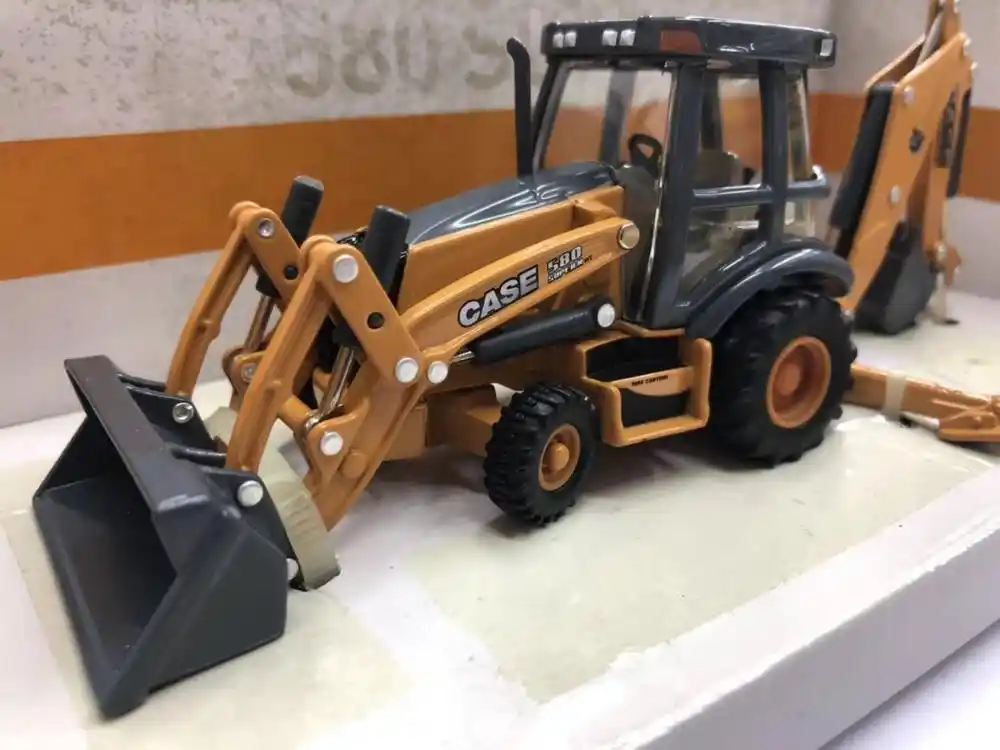 diecast case backhoe