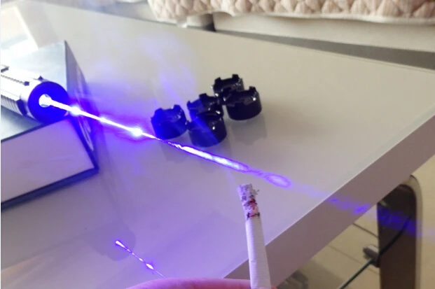 

Powerful Military blue laser pointer 2000000m 2000Watt 450nm Flashlight Light Burning Match/paper/black/burn cigarettes Hunting