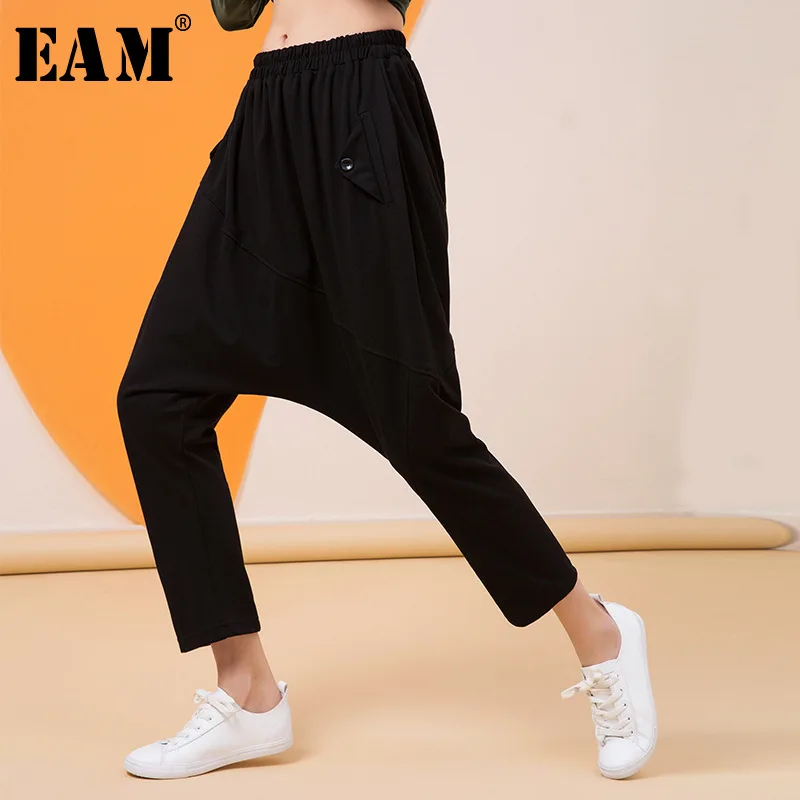 

[EAM] 2019 New Autumn Winter High Elastic Waist Black Pocket Split Joint Loose Harem Pants Women Trousers Fashion Tide JQ467