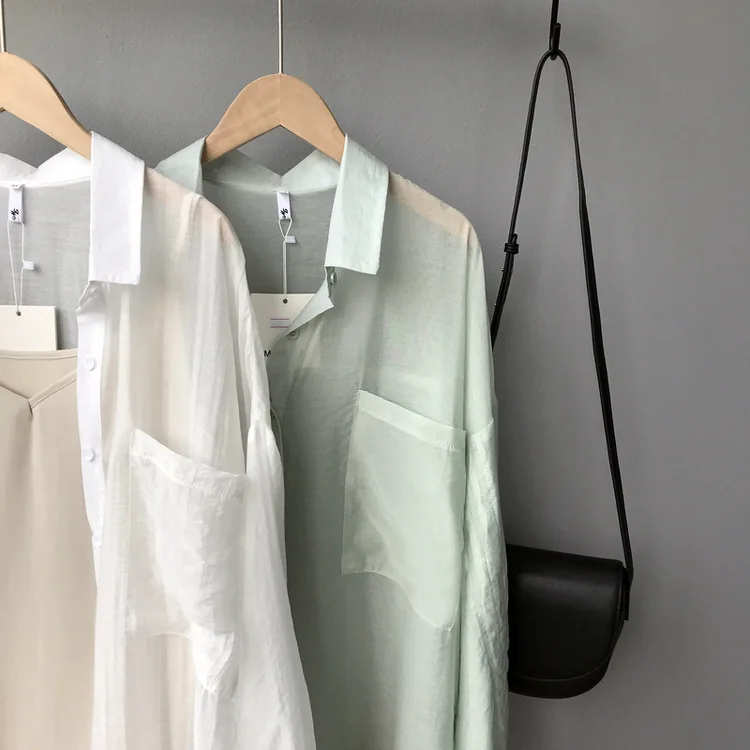 ملابس وقاية من الشمس 2019 الصيف جديد بلون قميص غير النظامية الرباط رقيقة القسم قميص معطف المرأة الملابس