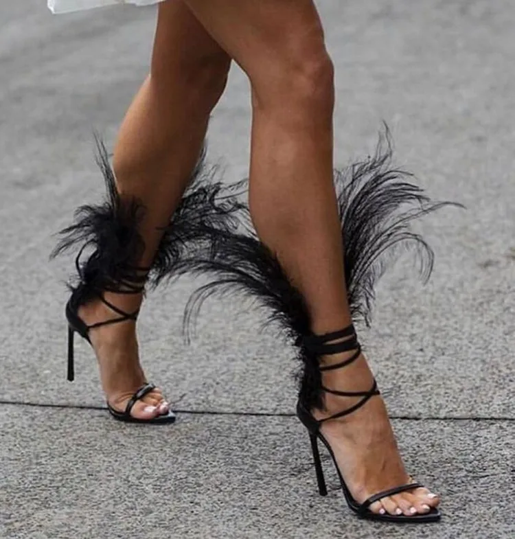yellow heels with feathers