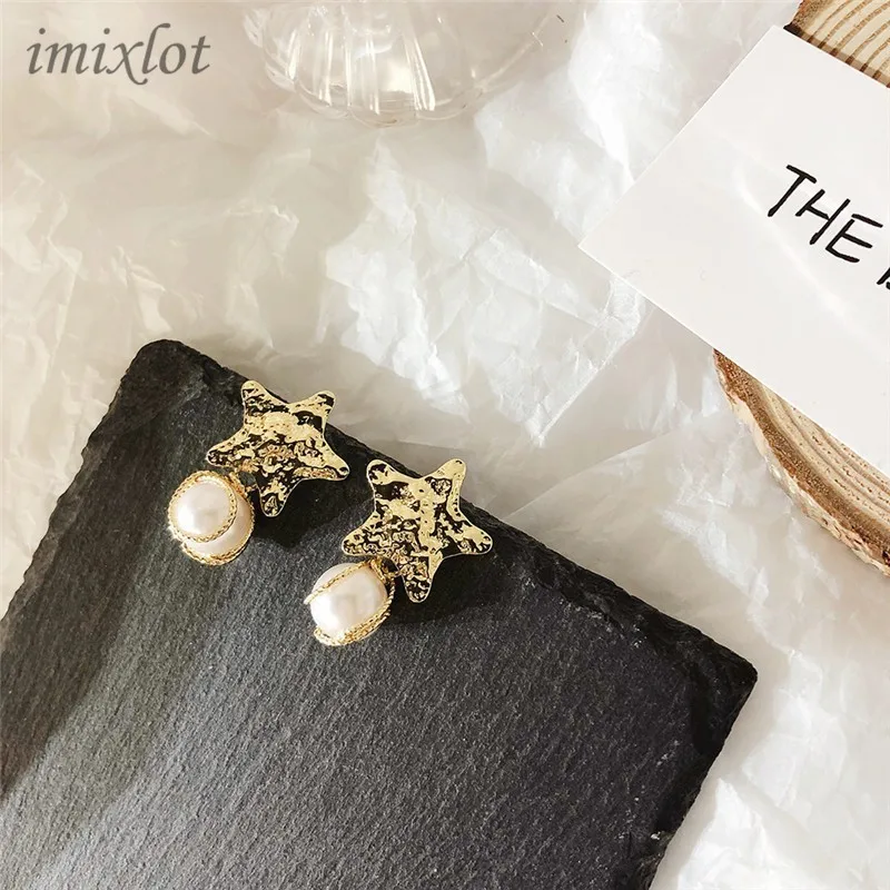 

Korean metal stars irregular earrings female twisted metal winding pearl earrings earrings