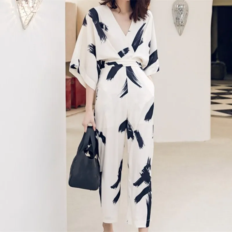 New Arrival Summer Women V-Neck Slim Jumpsuits Female Floral Print Three Quarter Sleeve Wide-Leg Rompers New Arrival Summer Women V-Neck Slim Jumpsuits Female Floral Print Three Quarter Sleeve Wide-Leg Rompers