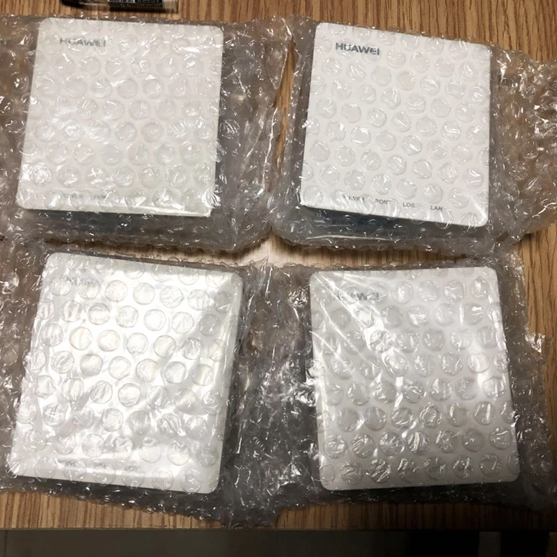 Beste 90% nieuw gebruikt 20pcs Huawei HG8010H C EPON ONU ftth fiber gebruikt GPON ont router 1GE Ont zonder dozen en power