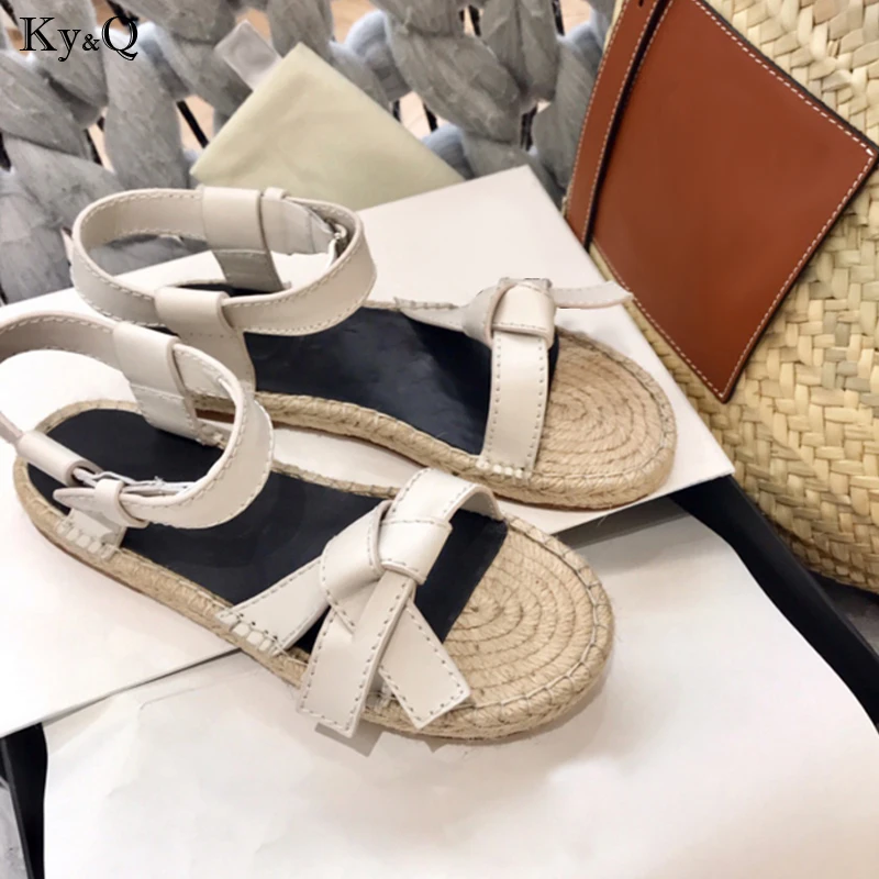 

2019 Summer New Ladies Roman Leather Buckle Comfortable Beach Straw Bow Outside Wearing Muffin Bottom Casual Wild Flat Sandals