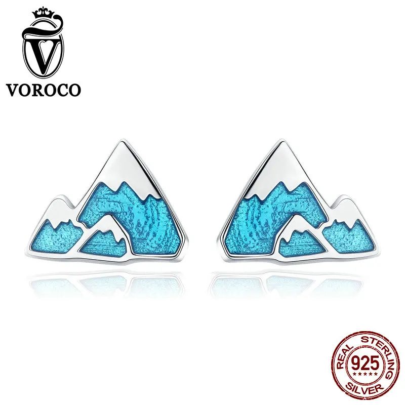 Серьги гвоздики VOROCO из серебра 925 пробы с голубым айсбергом серьги треугольной