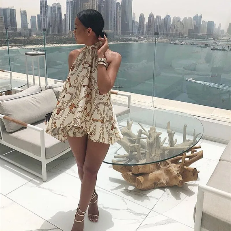 

Spring 2019 new style, fashion sleeveless European and American women's dress, printed hanging neck, backless two-piece dress