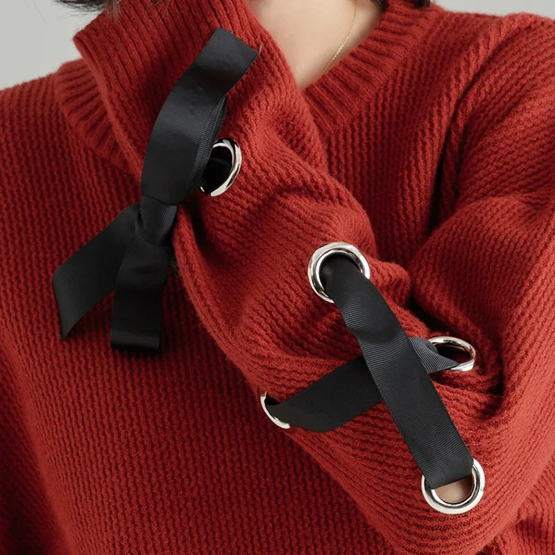 2018 autumn and winter new solid color knitted shirt long-sleeved side cross strap simple sweater loose bottoming sweater sj1114