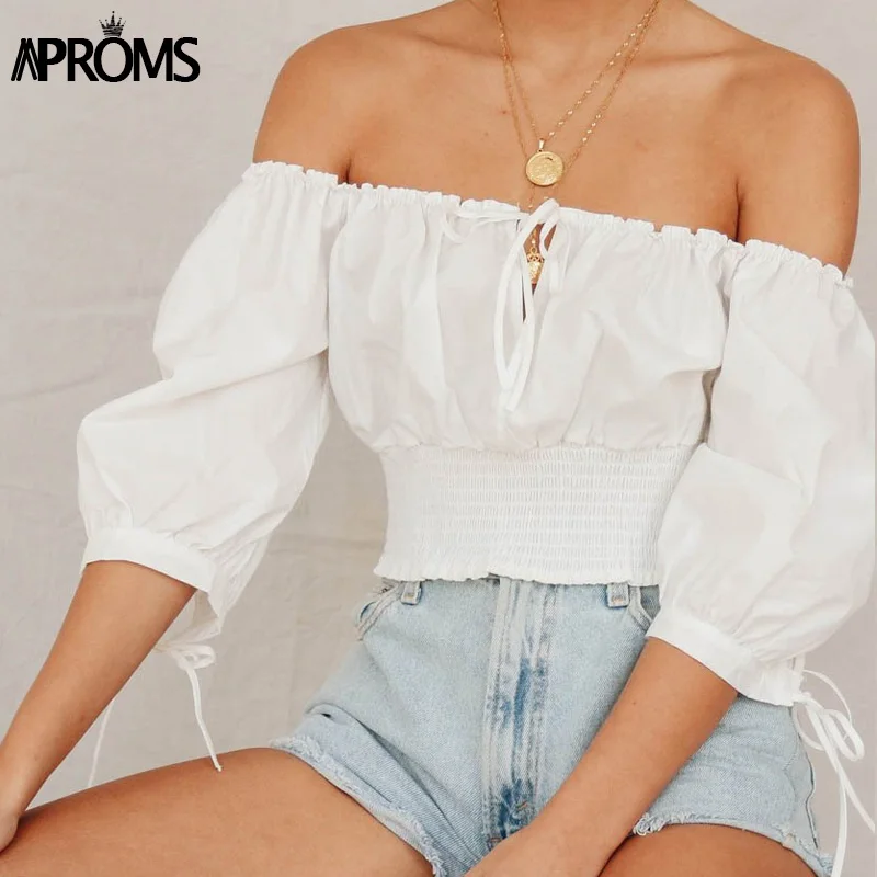

Aproms Elegant Off Shoulder Smocked Blouse Shirt Women 3/4 Sleeve Tie Up White Crop Top Summer Streetwear Elastic Tee Blusa 2019