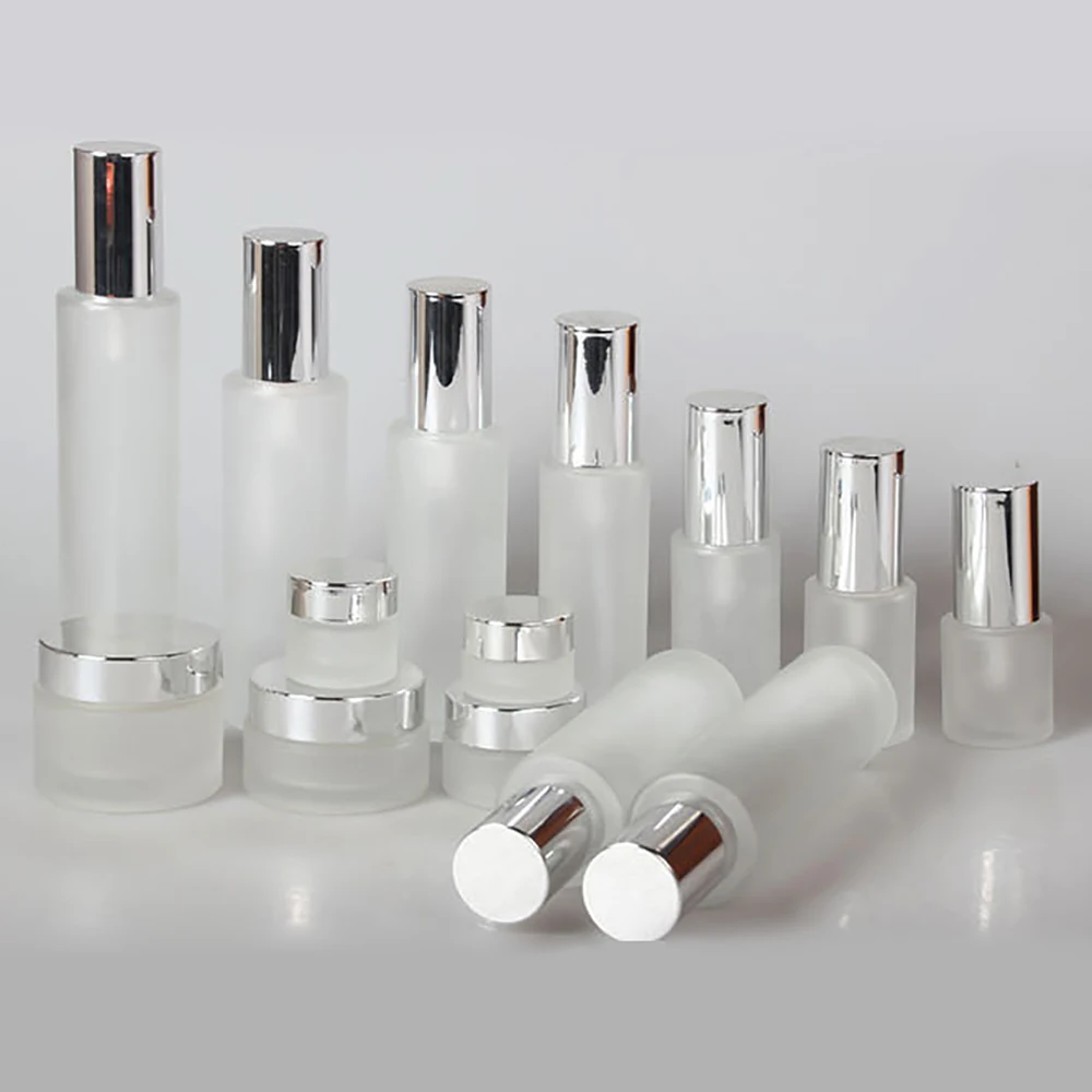 

100pcs 100ml frosted bottle with shiny silver screw cap and mist spray pump, 100pcs 20g 50g frosted glass jar for cream