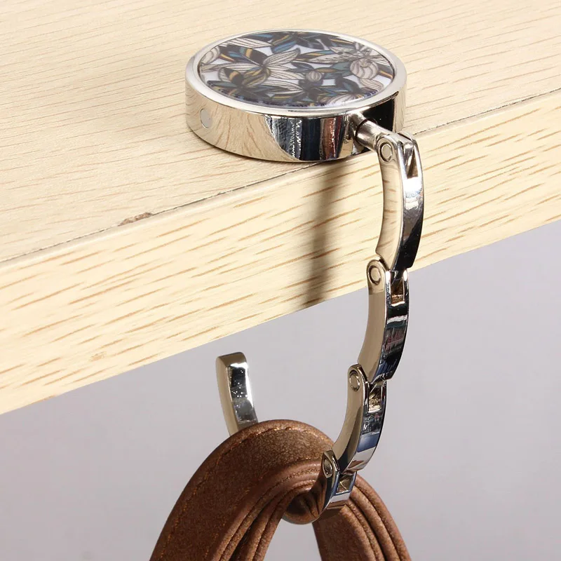

Metal Foldable Bag Purse Hook Bag Hanger/Purse Hook/Handbag Holder Shell Bag Folding Table WXV Sale