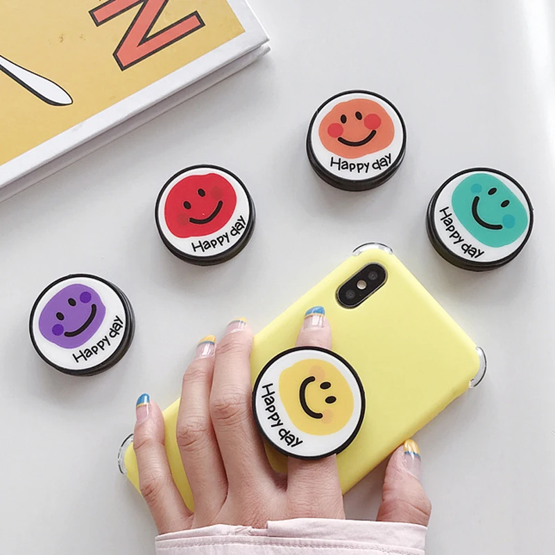 

Universal mobile phone bracket Cute Smiley face fold Phone Expanding Stand Finger Holder for iphone Samsung Huawei Xiaomi holder