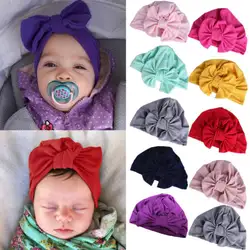 США младенческой новорожденных мальчиков девочек Твердые тюрбан пончик кепки Beanie головные уборы с бантами Новые