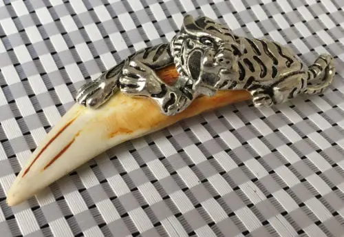 

Chinese Antique Boars Tooth Wild Hog Silver tiger protective talisman Pendant