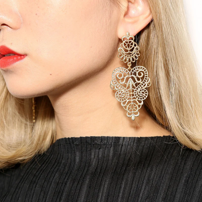 

Vintage Bohemian Hollow Leaves Earrings Pendientes Statement Fashion Jewelry Geometric Long Drop Earrings for Women Party Gift
