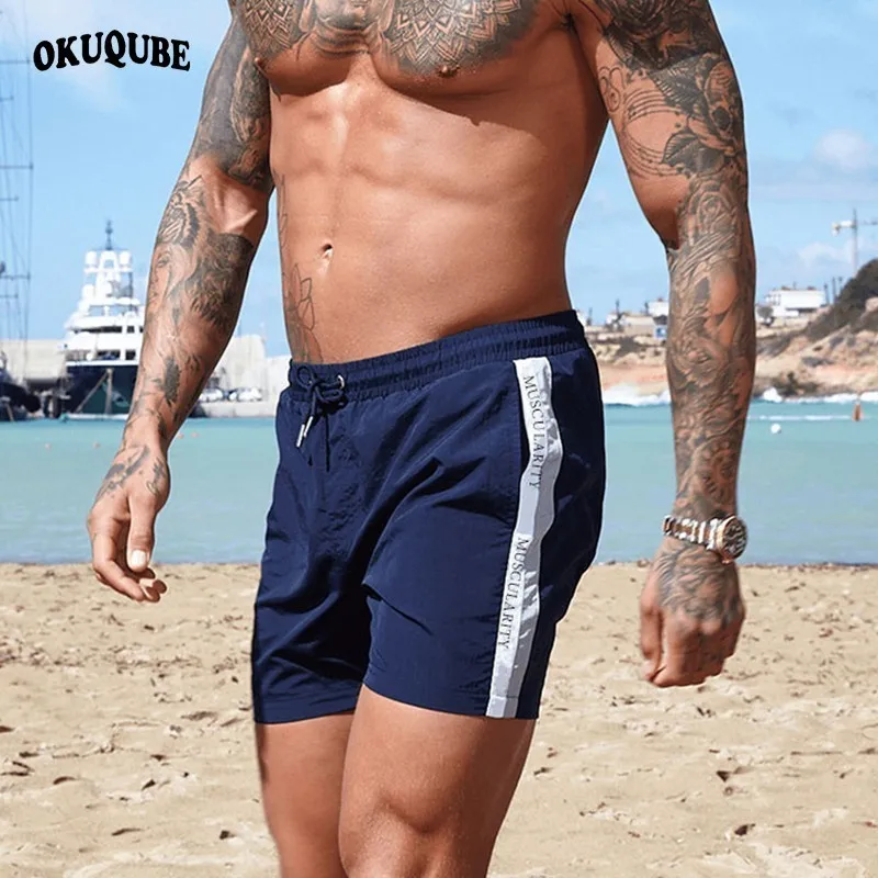 black and red swim trunks