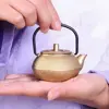 Caliente 1 pc Mini estilo japonés de hierro fundido hervidor de té Tetsubin té pequeña olla 50ml fácil de llevar conveniente Oficina té olla 50ml ► Foto 2/6