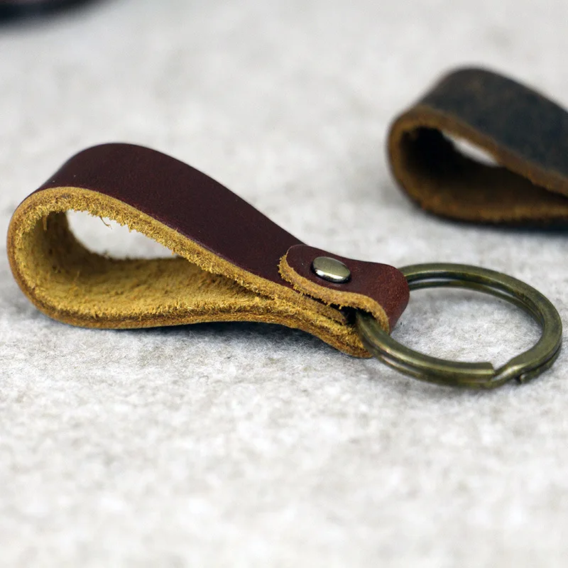 

2019 jingyang Man Head Layer Cowhide Crazy Key Chain Buckle Variegated fur leather Keychain keyring Free shipping