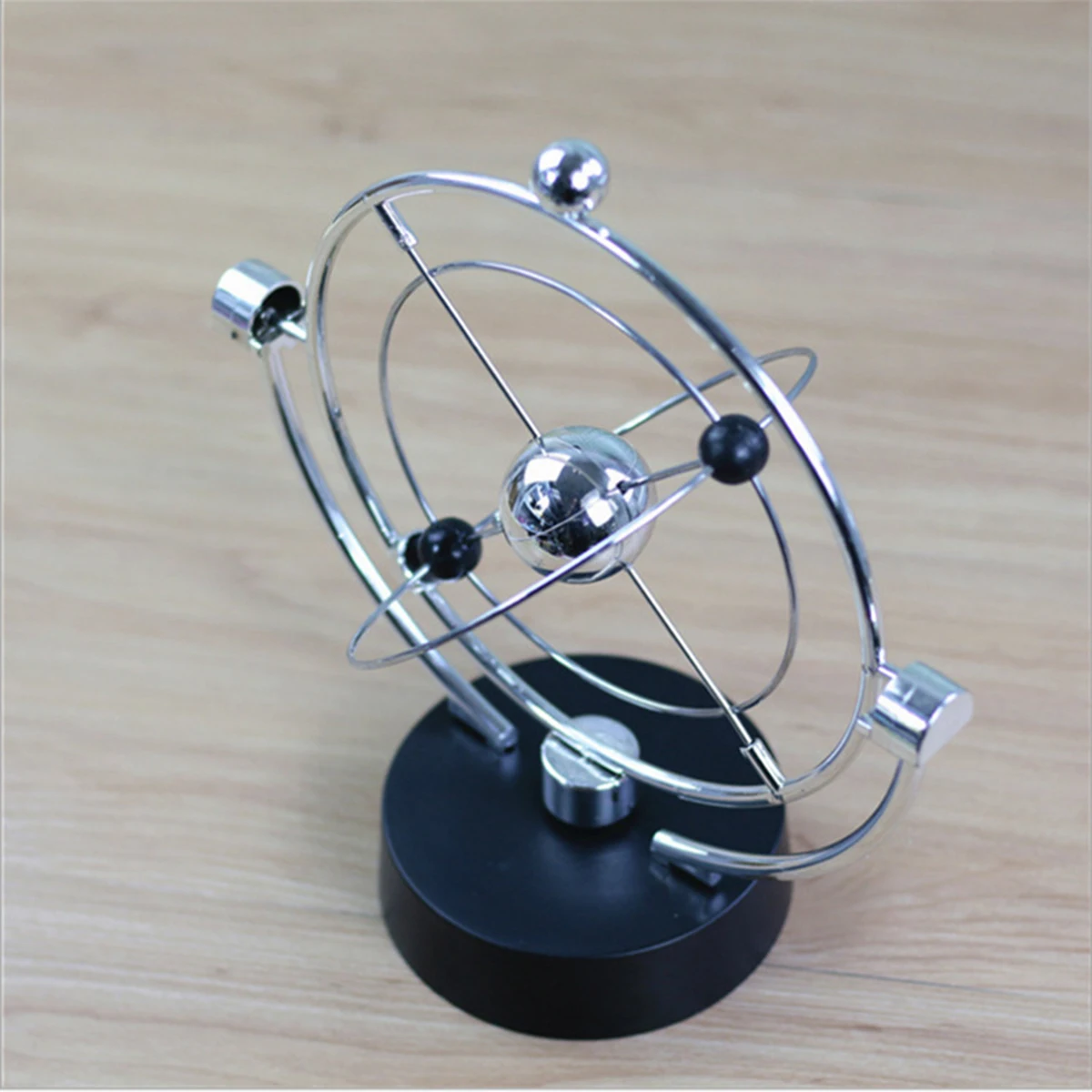 

Birthday Gift Kinetic Orbital Revolving Gadget Perpetual Motion Desk Office Home Decor Art Toy Permanent instrument decoration