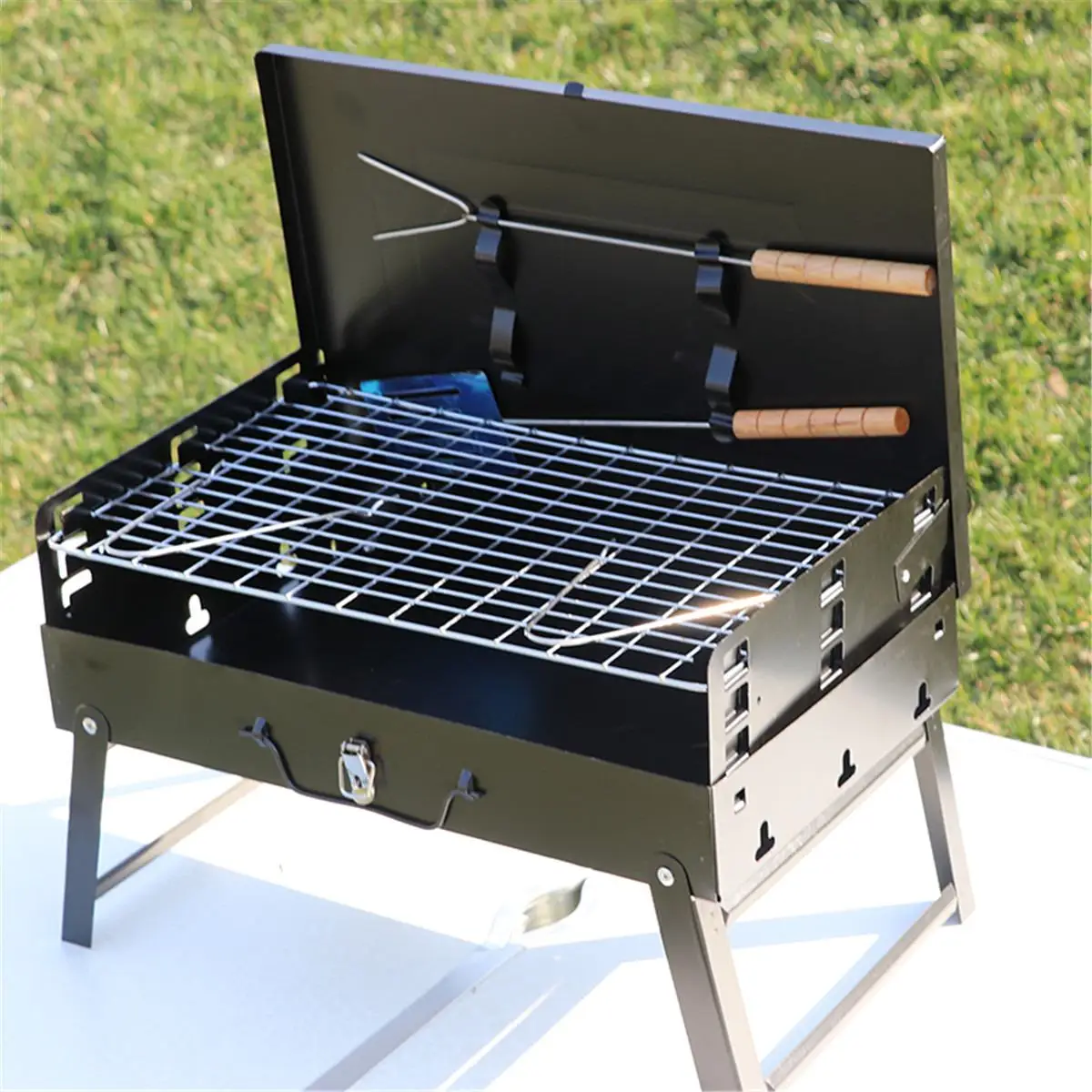 

Folding Portable BBQ Barbecue Grill Charcoal Camping Garden Outdoor With Tools Stainless Steel with 4 Foldable Legs Adjustable