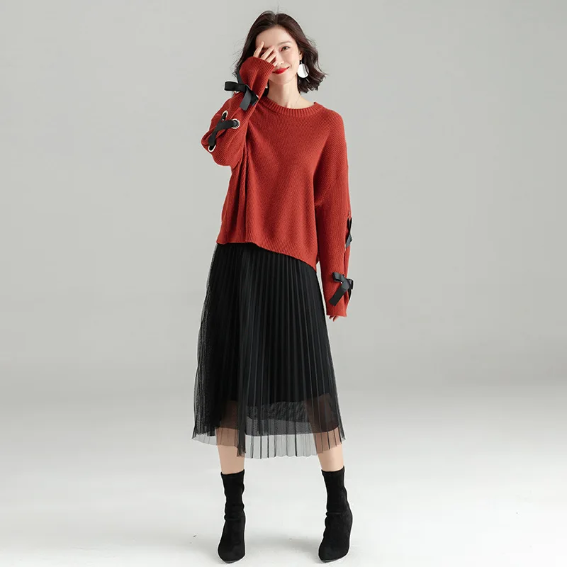 2018 autumn and winter new solid color knitted shirt long-sleeved side cross strap simple sweater loose bottoming sweater sj1114