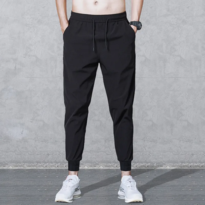 

2019 Fashion Solid Color Pulling Rope men trousers Casual Male Haren Pants joggers sweatpants Free shipping