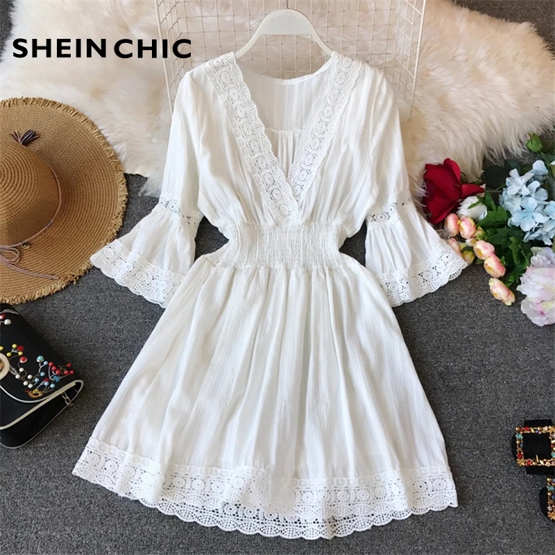 

Runway Designer Dress 2019 Summer Women White Elegant Flare Sleeve Hollow Out Lace Dress Vacation Boho Chic Mini Dress