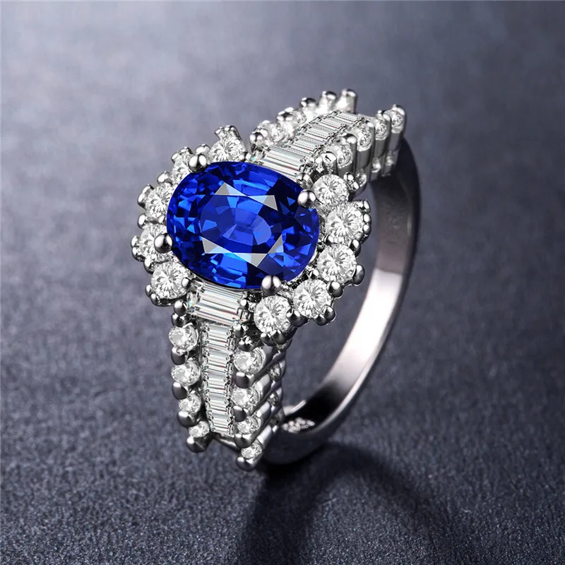 

Huitan Wedding Anniversary Ring with Oval Cutting Blue Cubic Zirconia Vintage Jewelry Fashion Cocktail Party Rings for Women