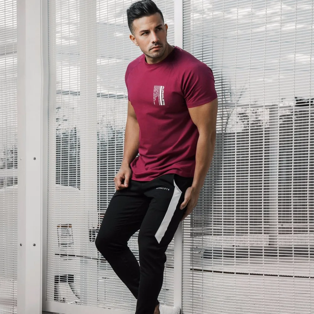 

2019 New Summer Mens Brand Gyms t shirt Bodybuilding Crossfit Slim Cotton Short Sleeve Printed ALPHALETE Fitness Tee Casual Tees