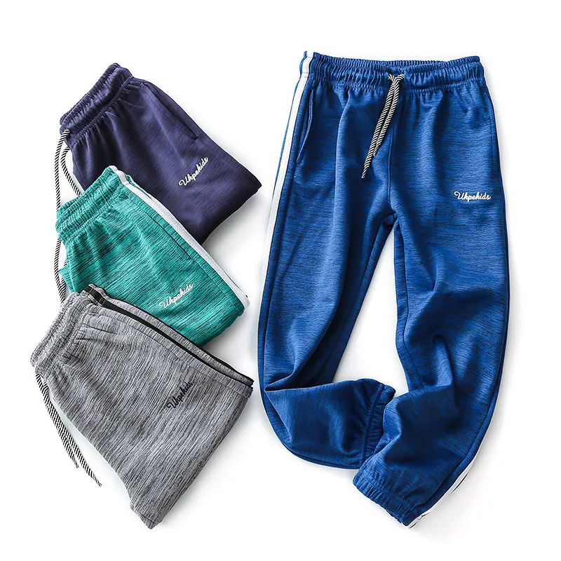 

New children's sports trousers. Boys Girls Cotton kids sweatpants Unisex Solid