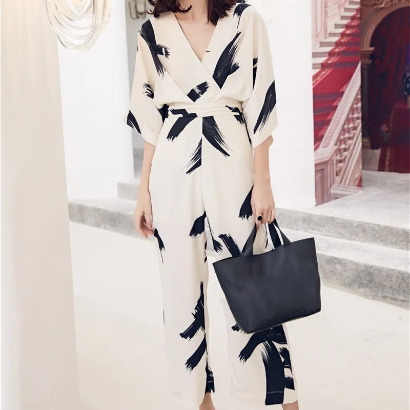 New Arrival Summer Women V-Neck Slim Jumpsuits Female Floral Print Three Quarter Sleeve Wide-Leg Rompers New Arrival Summer Women V-Neck Slim Jumpsuits Female Floral Print Three Quarter Sleeve Wide-Leg Rompers