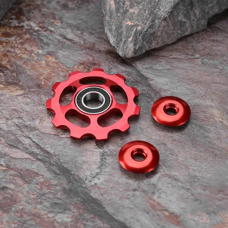 سبائك الألومنيوم في الهواء الطلق 11 T MTB دراجة الخلفي Derailleur عجلة شدادة السيراميك تحمل بكرة الطريق الدراجة دليل الأسطوانة دراجة أجزاء سبائك الألومنيوم في الهواء الطلق 11 T MTB دراجة الخلفي Derailleur عجلة شدادة السيراميك تحمل بكرة الطريق الدراجة دليل الأسطوانة دراجة أجزاء