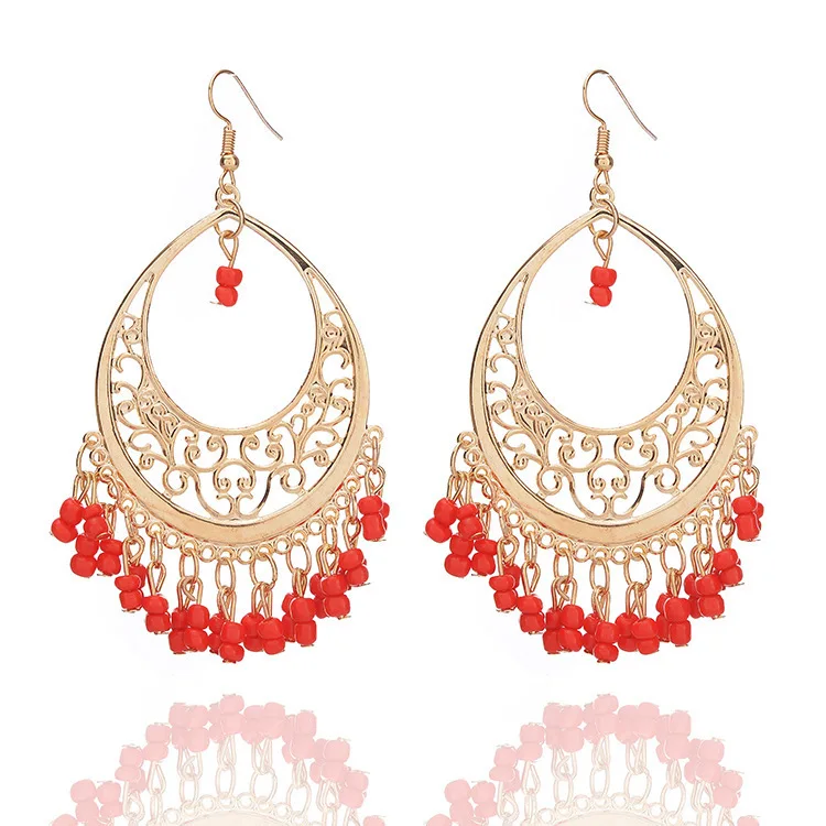 

new ladies tassel earring Decorate Pretty Girl Temperament Fund Hollow Out Drip Measly Tassels bead folk-custom Earrings