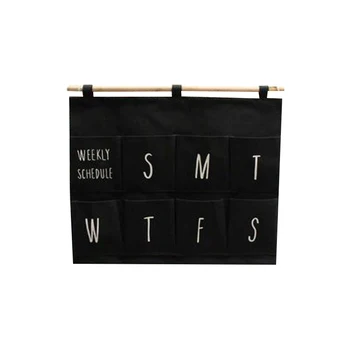 

Wall hanging type sundry storage bag simple black cotton and linen fabric creative week daily finishing sorting grid hanging bag