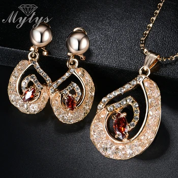 

Mytys High Level Wire Mesh Net Tube filled Crystal Jewelry Sets Drop Earring and Pendant Necklace Sets CN294