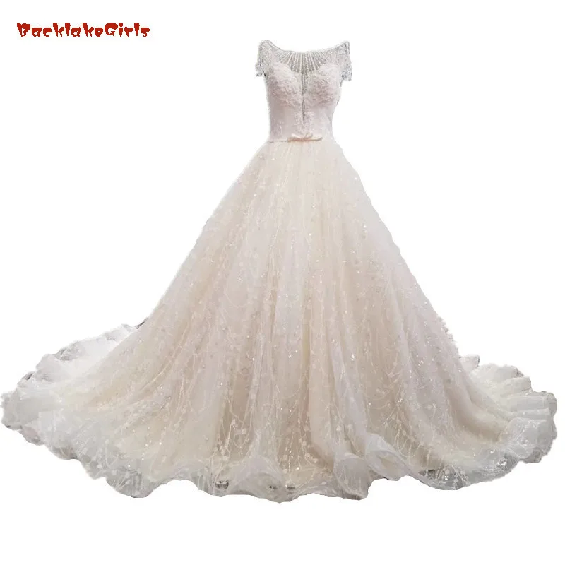 

Real Work Wedding Dresses With Crystals Ball Gown Champange Color Bling Bling Luxurious Lace Handworks Bridal Wedding Dresses