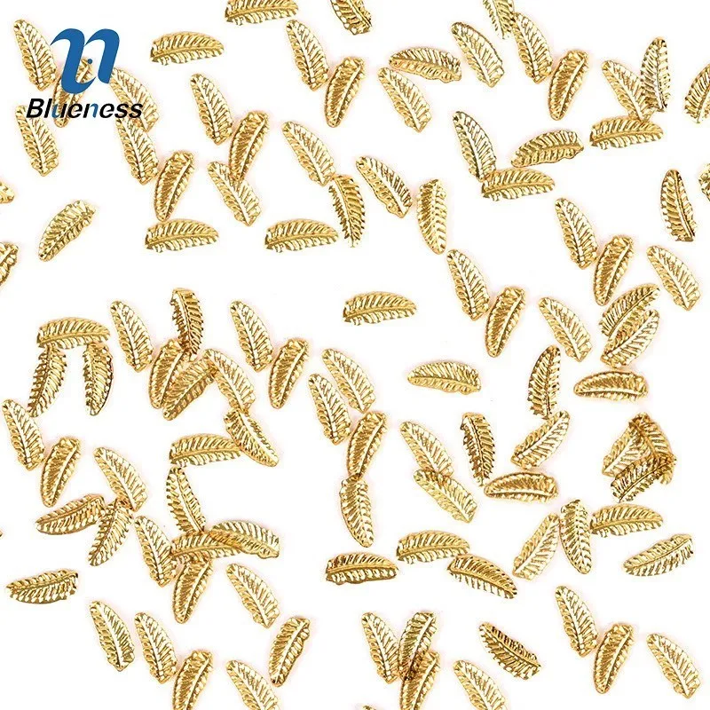 

Blueness 1000Pcs/Lot 3D Glitter Nail Art Decoration Charms Rivet Gold Color Nails Accessories Tree Leaves Design Nail Jewelry